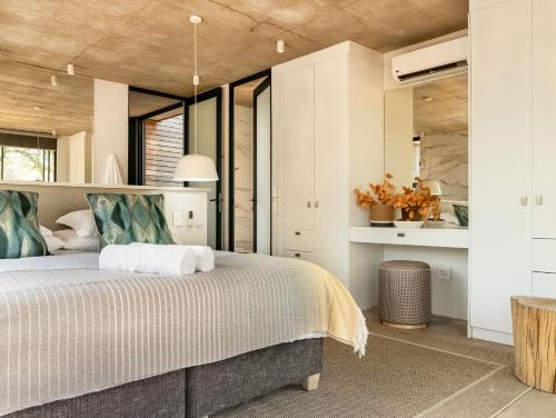 En eller flere senger på et rom på Garangani 360 - Self-Catering Villa