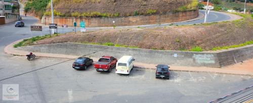 a group of cars parked in a parking lot at Spazio Martinelli in Santa Teresa