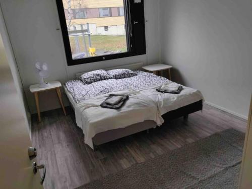 Style 2BR appartment in Tornio cityにあるベッド
