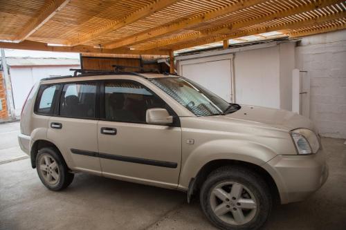 a small white car parked in a garage at Loft Tongoy 2 Interior sin vista al mar in Tongoy