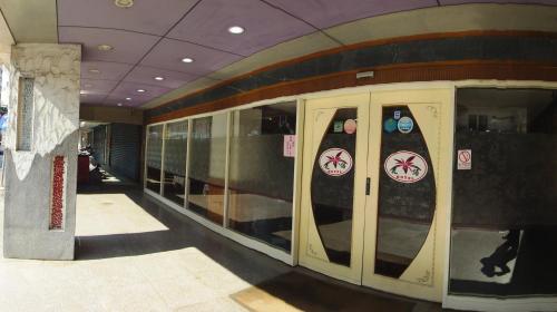 a subway train with signs on the doors in a building at Hua Yue Hotel in Taoyuan
