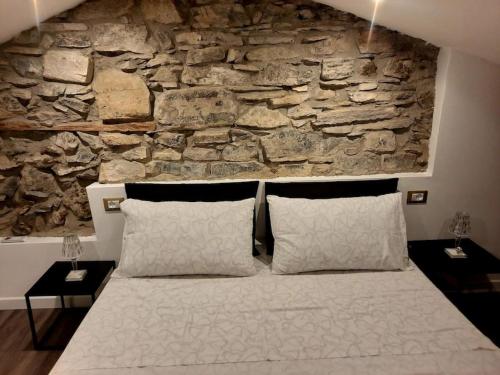 Ένα ή περισσότερα κρεβάτια σε δωμάτιο στο Luxury Room La Terrazza sul Lago di Como
