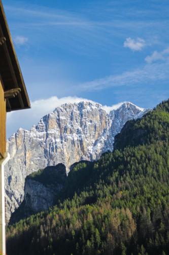 a view of a mountain from a train at Una Civetta sul Lago in Alleghe