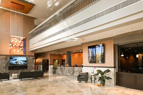 a lobby of a hotel with a waiting area at Grand Resort Hotel - Mt Laurel - Philadelphia in Mount Laurel