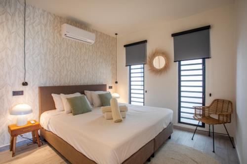 Postel nebo postele na pokoji v ubytování Blue Bay Reef apartment 19