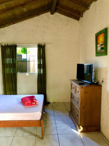 Postel nebo postele na pokoji v ubytování Cabanas Prema