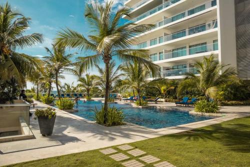 Bazén v ubytování condo vista al mar epic rnt 12078 nebo v jeho okolí