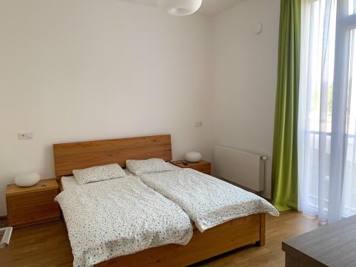 En eller flere senge i et værelse på Apartmán Dolce Vita 1.5