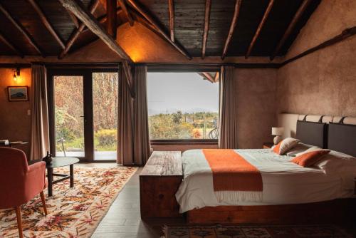 Postel nebo postele na pokoji v ubytování Chilcabamba Lodge