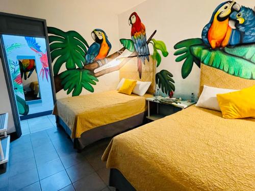 Ein Bett oder Betten in einem Zimmer der Unterkunft Hotel y Arte Antigua
