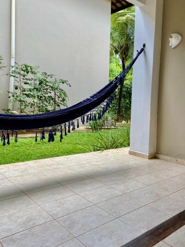 Taman di luar Apartamento Pimenta Rosa, 400m do mar, rua principal