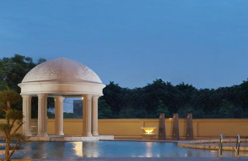 a gazebo in the middle of a pool at BW Kemayoran Hotel & Convention Powered by Archipelago in Jakarta