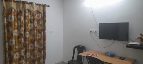 TV/Unterhaltungsangebot in der Unterkunft B & B Konni, Pathanamthitta