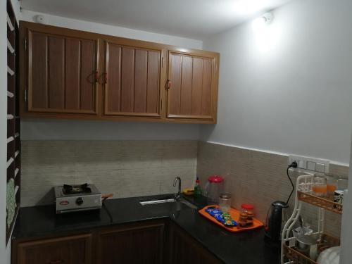 Küche/Küchenzeile in der Unterkunft B & B Konni, Pathanamthitta