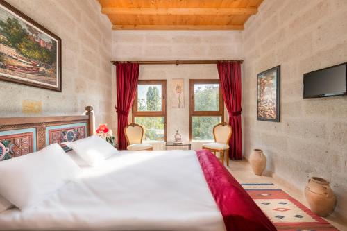 Cama o camas de una habitación en HacıAşık Konağı Butik Hotel