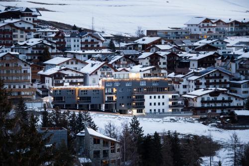a group of houses in a snow covered city at Alpex-Serfaus in Serfaus