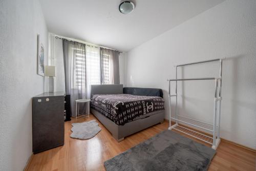 Ένα ή περισσότερα κρεβάτια σε δωμάτιο στο Private Apartment