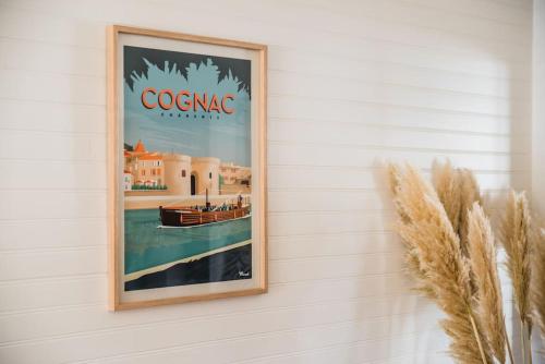 a picture of a boat on a wall at Sublime T2 avec balcon, wifi, linge #centre ville in Cognac
