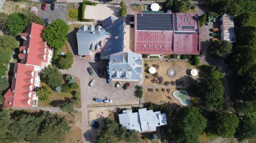 an overhead view of a building with a yard at OWR Universal in Łazy