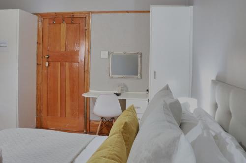 Postel nebo postele na pokoji v ubytování Padlangs Self-catering flats