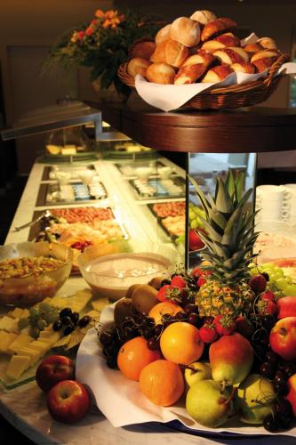 a buffet with many different types of food on a table at Park-Hotel am Rhein - Gesundheitshotel und Residenzen in Rheinfelden