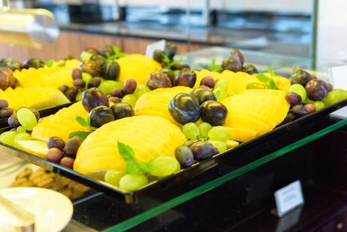 a display case with a bunch of different types of fruit at Primavera Jastrzębia Góra in Jastrzębia Góra