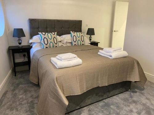 Postelja oz. postelje v sobi nastanitve Apartment 10 Penthouse 2 bedrooms, sleeps x 4