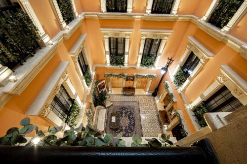 an overhead view of a building with plants at Sapphire Bayil Hotel in Baku