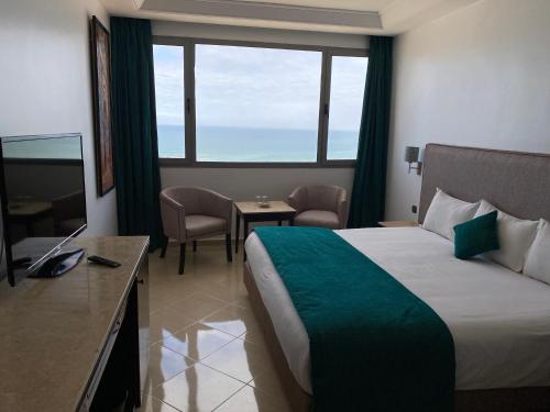 Una cama o camas en una habitación de Hotel Azur
