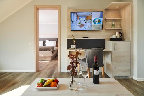 TV o dispositivi per l'intrattenimento presso R&R Strandhotel Baabe