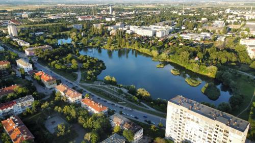 an aerial view of a city with a river at Апартамент на няколко минути от Летището in Sofia