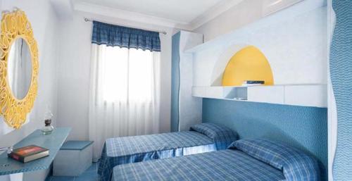 Säng eller sängar i ett rum på Bono Vacanze Villa Maragani Charme & Relax
