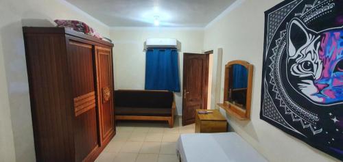 a small room with a bed and a couch at Dahab house apartment in Dahab