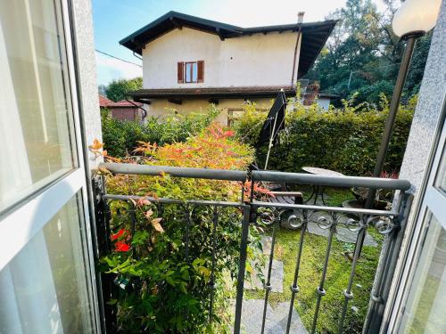 a view of a house from an open balcony at hotel garni Santa Caterina in Orta San Giulio