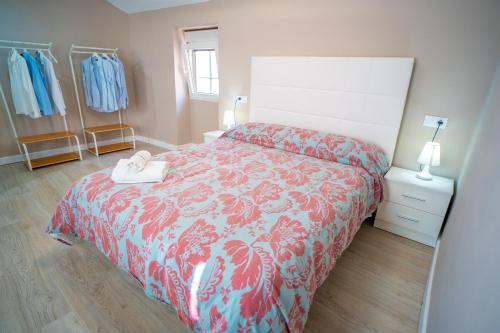 Posteľ alebo postele v izbe v ubytovaní Apartamento Cuesta de las Piletas
