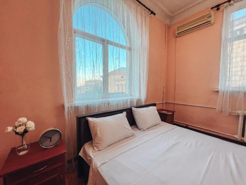 Posteľ alebo postele v izbe v ubytovaní Apartments On Kreshchatik 17