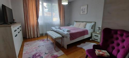 Postel nebo postele na pokoji v ubytování Infinity Boutique Apartments