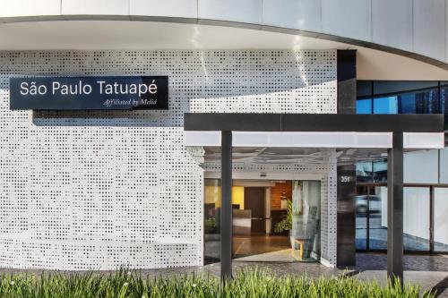 a building with a sign for a sao paulo earthquake at São Paulo Tatuape, Affiliated by Meliá in Sao Paulo