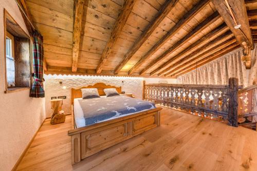 Posteľ alebo postele v izbe v ubytovaní Chalet Catinaccio Rosengarten 18