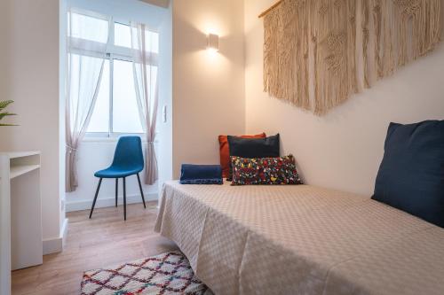 A bed or beds in a room at Lovely Apartment in Portimão with River view