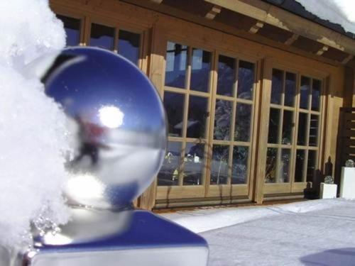 a close up of a sculpture in front of a building at Landhaus Panorama in Reutte