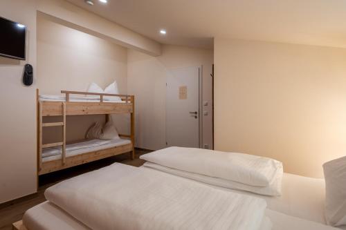 Ένα ή περισσότερα κρεβάτια σε δωμάτιο στο Penthouse „Das Besenhaus“