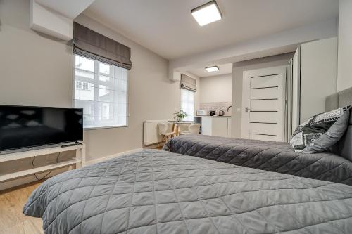 Ένα ή περισσότερα κρεβάτια σε δωμάτιο στο Central Platinum Apartments 18