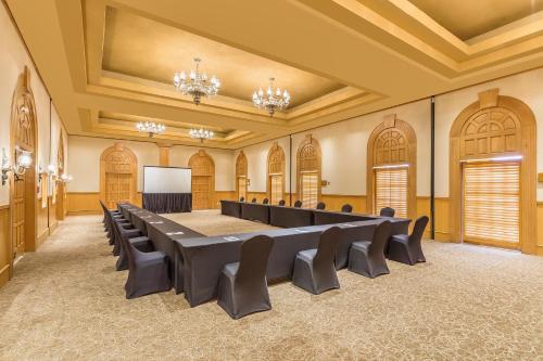 a conference room with a large table and chairs at Grand Fiesta Americana Los Cabos All Inclusive Golf & Spa in Cabo San Lucas