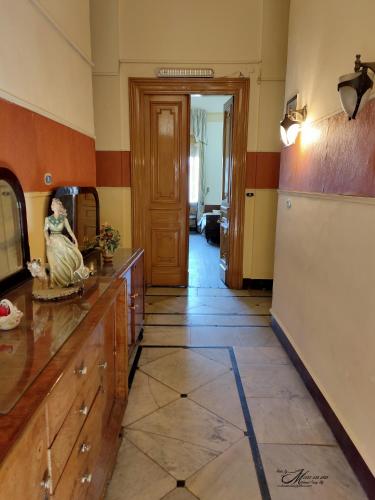 a kitchen with a refridgerator and a refrigerator at Clement's House Hostel in Alexandria