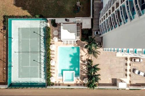 Výhled na bazén z ubytování Marbel Elegante Apartamento en Playa Juan Dolio nebo okolí