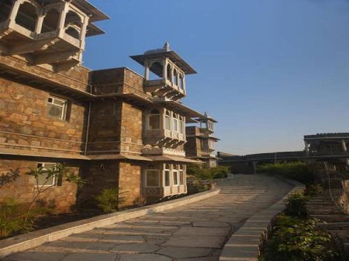an old stone building with a cobblestone street at The Amargarh in Udaipur