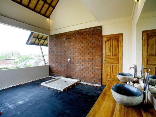 Ванная комната в Villa Cokelat