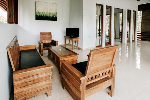 TV a/nebo společenská místnost v ubytování Budhi Ayu Villas and Cottages Ubud by Mahaputra-CHSE Certified