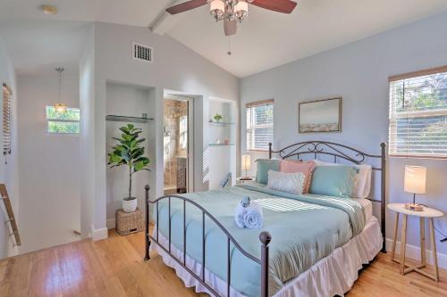 a bedroom with a bed and a ceiling fan at Modern 2 Bd and Loft Getaway Less Than 9 Mi to Dtwn! in Miami